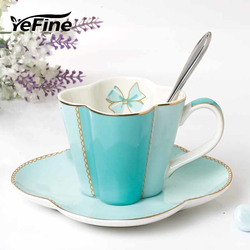 YeFine Ceramic Coffee Cup And Saucer Four Leaf Clover Design Porcelain Tea Cup Set With Stainless